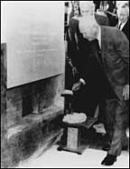 Photo showing President Dwight D. Eisenhower laying the Cornerstone