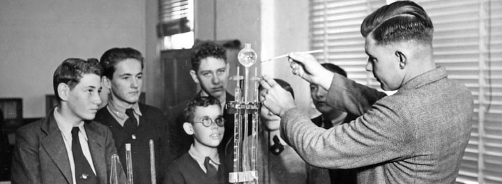 Black and white photo of early 20th century science class