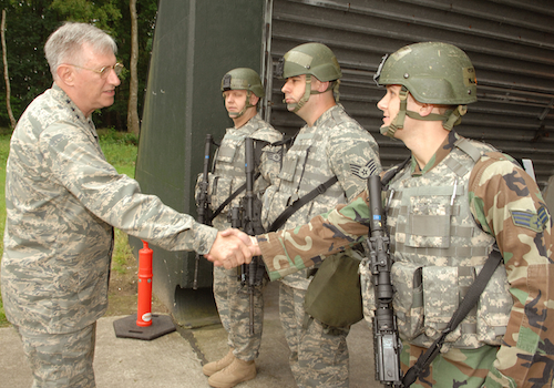 Former US Air Force Europe commander General Rodger Brady shakes hands with 703 Munitions Support Squadron personnel at Volkel Air Base in June 2008 during security upgrades to U.S. nuclear weapons storage sites in Europe. More expensive security upgrades are planned.